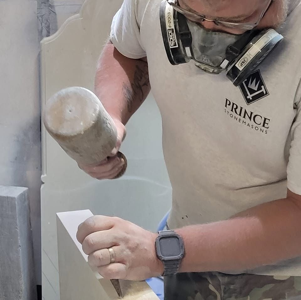 Alan Prince at work on a memorial