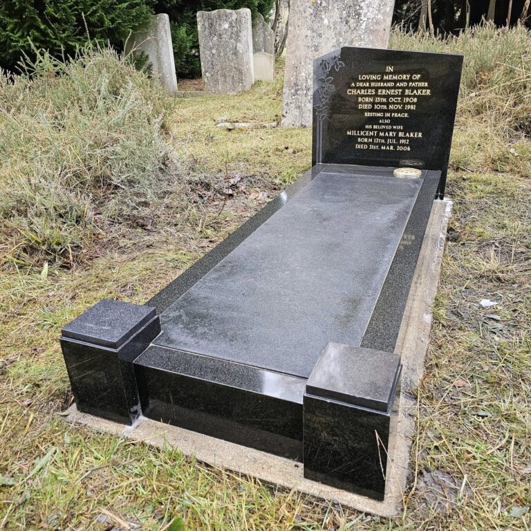 Black granite kerbed memorial