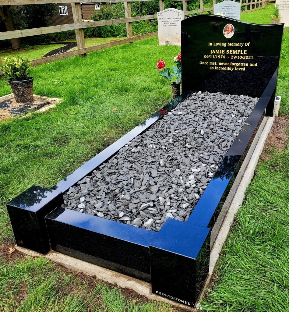 Black granite kerbed memorial with grey chippings