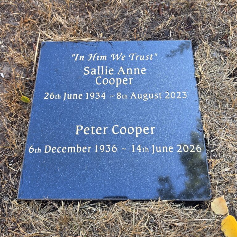 Blue granite commemorative plaque with gold lettering