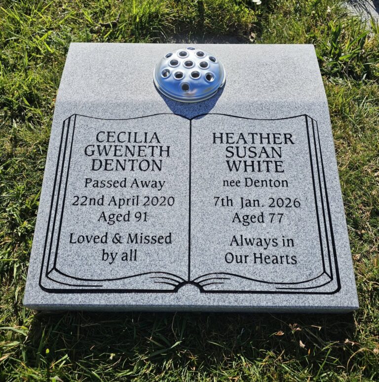 Grey granite open book memorial tablet