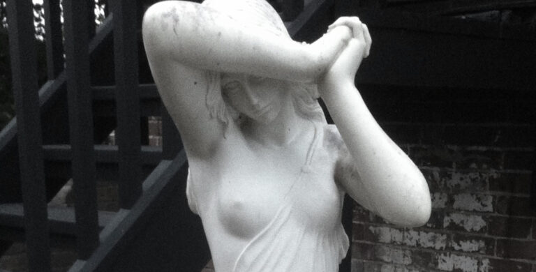 White marble figure statue cleaned and restored