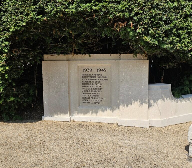 Restored stone war memorial wall