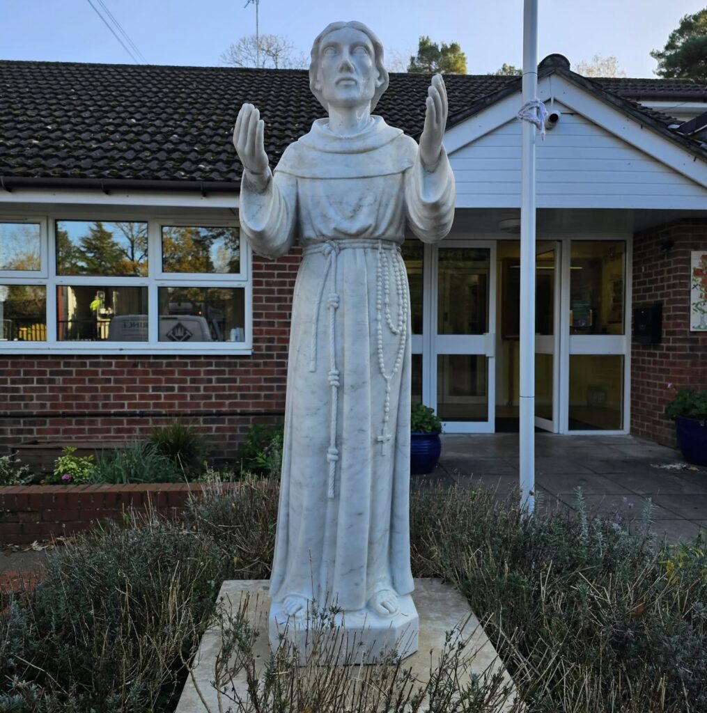 St Francis statue at a school after cleaning