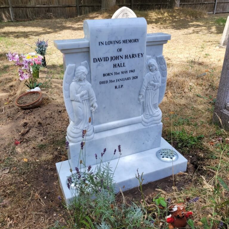 White carved angel headstone